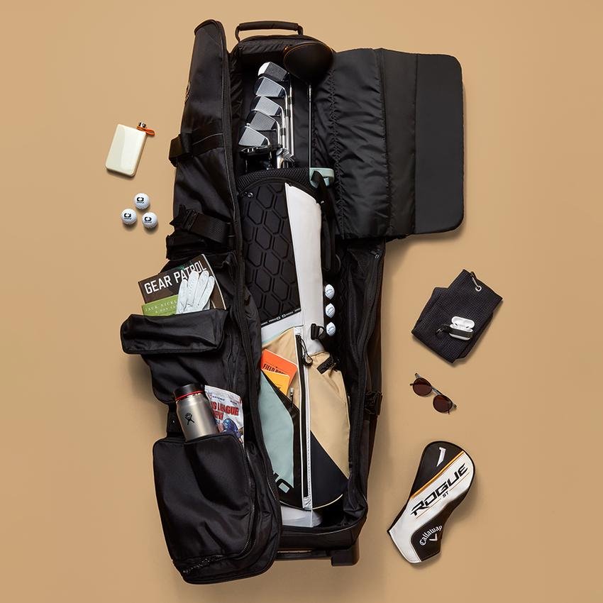 Golf trip packing checklist with golf clubs and travel gear